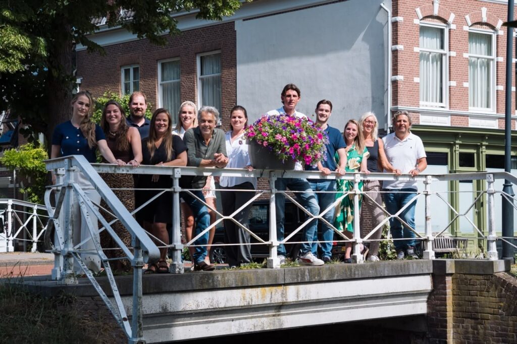 Group of people standing on a bridge