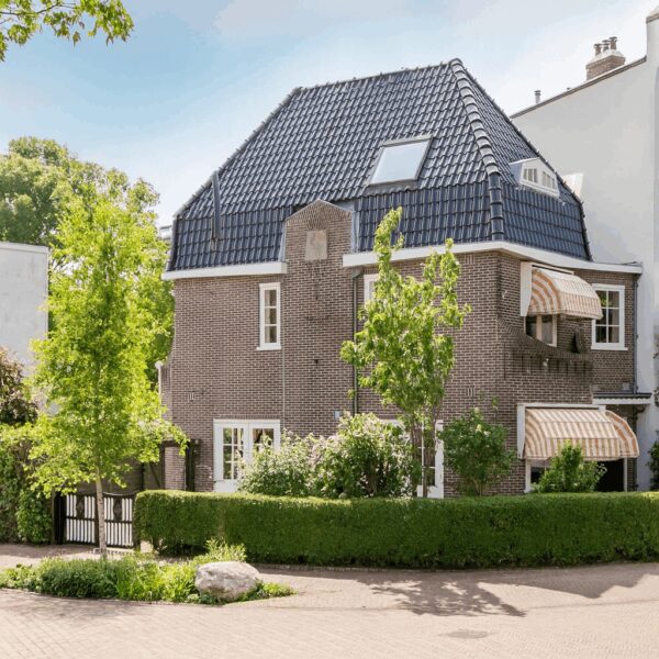 Charming brick house with blue tiled roof