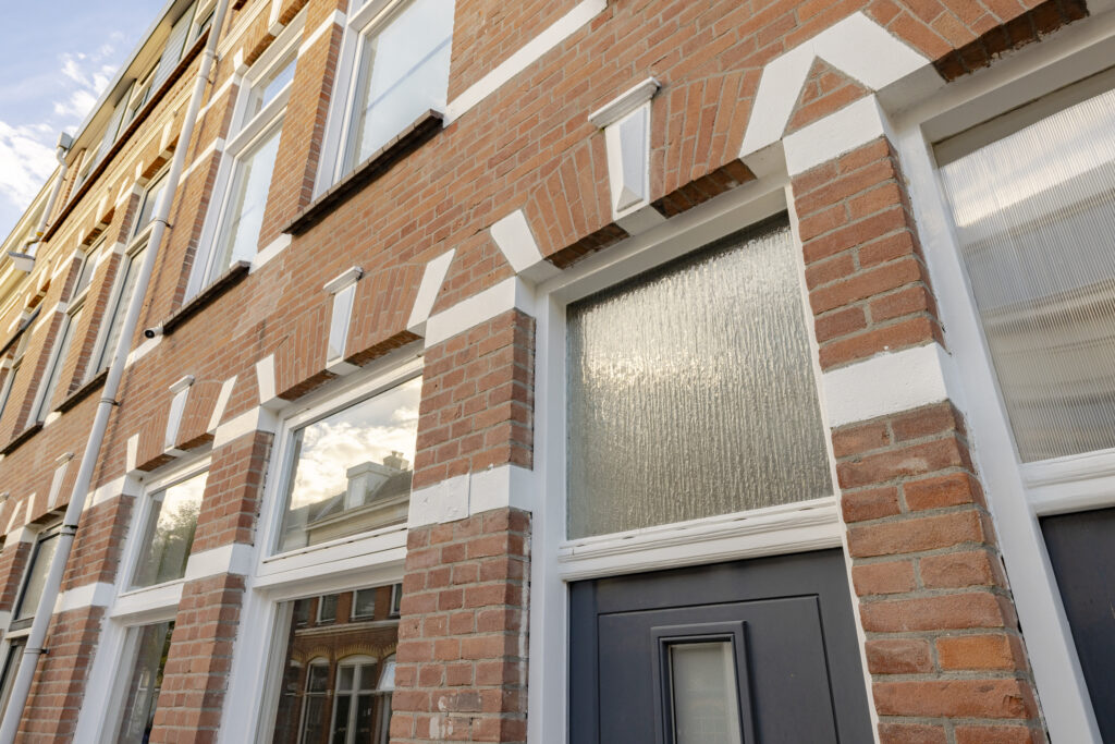 Modern brick townhouse with large windows