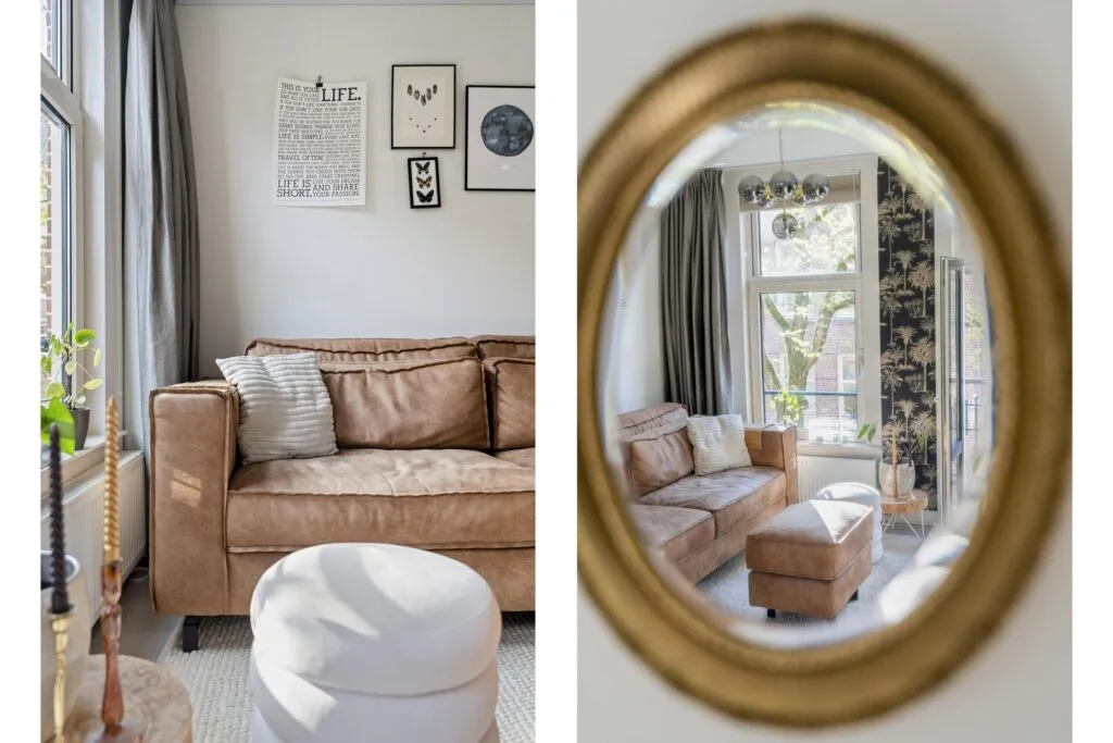 Cozy living room with brown sofa and wall art.