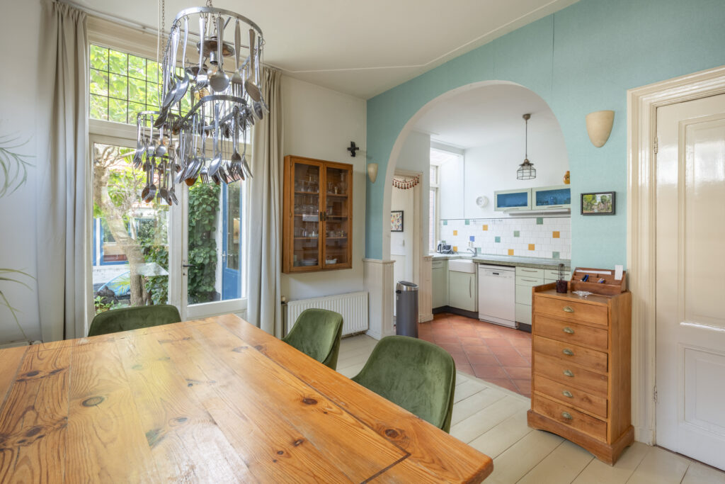 Bright kitchen with rustic wooden dining table