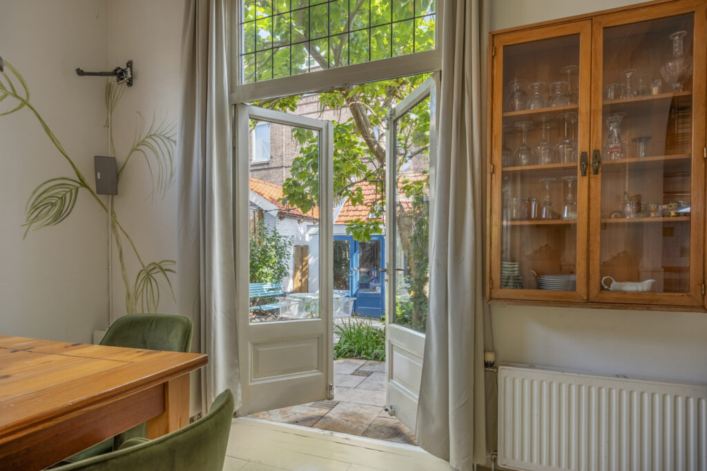 Open French doors to garden view