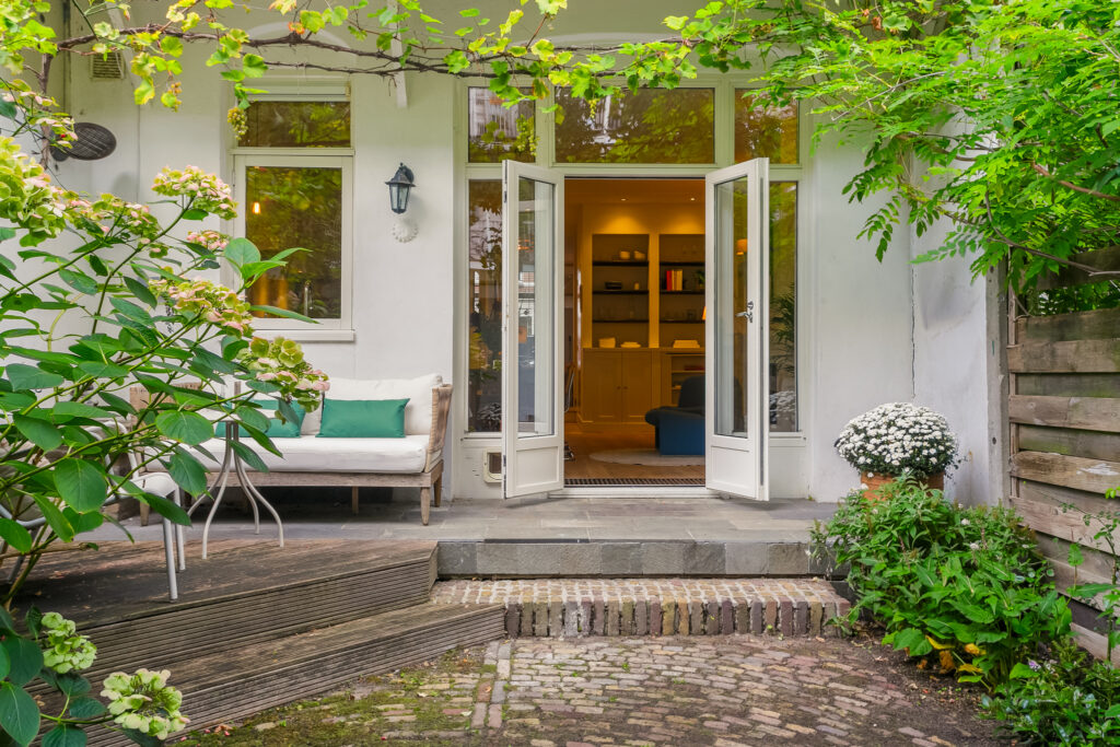 Cozy garden patio with open double doors
