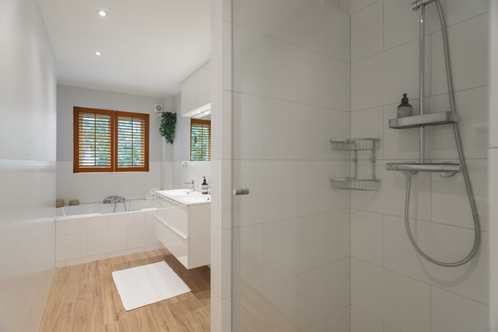 Modern bathroom with shower and bathtub