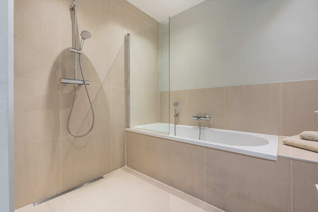 Modern bathroom with shower and bathtub