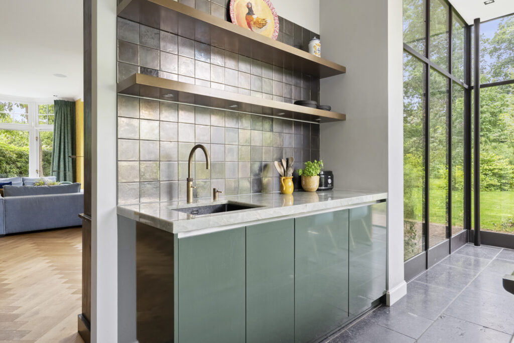 Modern kitchen with garden view.