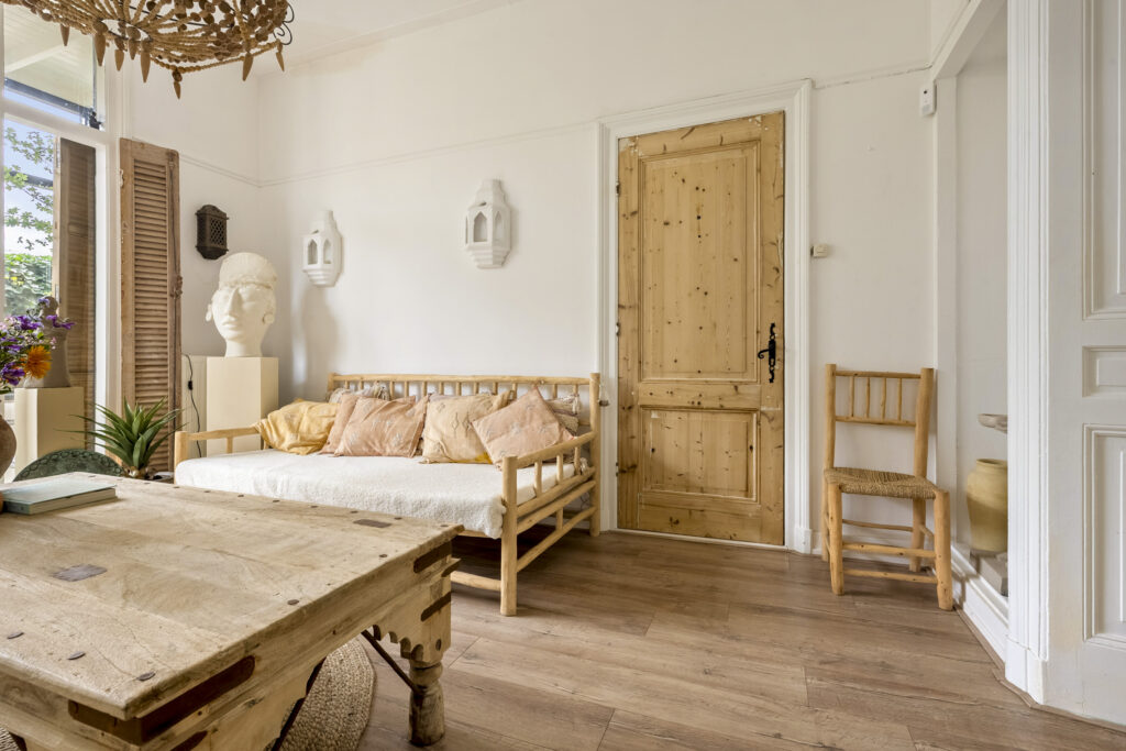 Cozy living room with wooden furniture and decor.