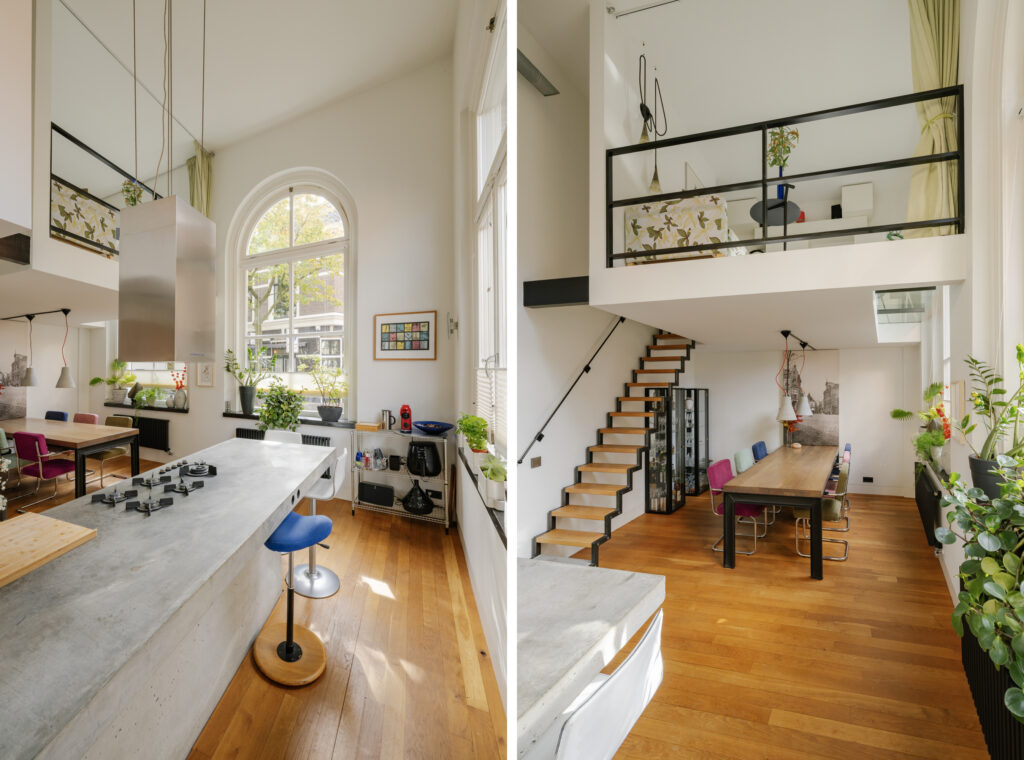 Modern loft kitchen and dining area with plants.