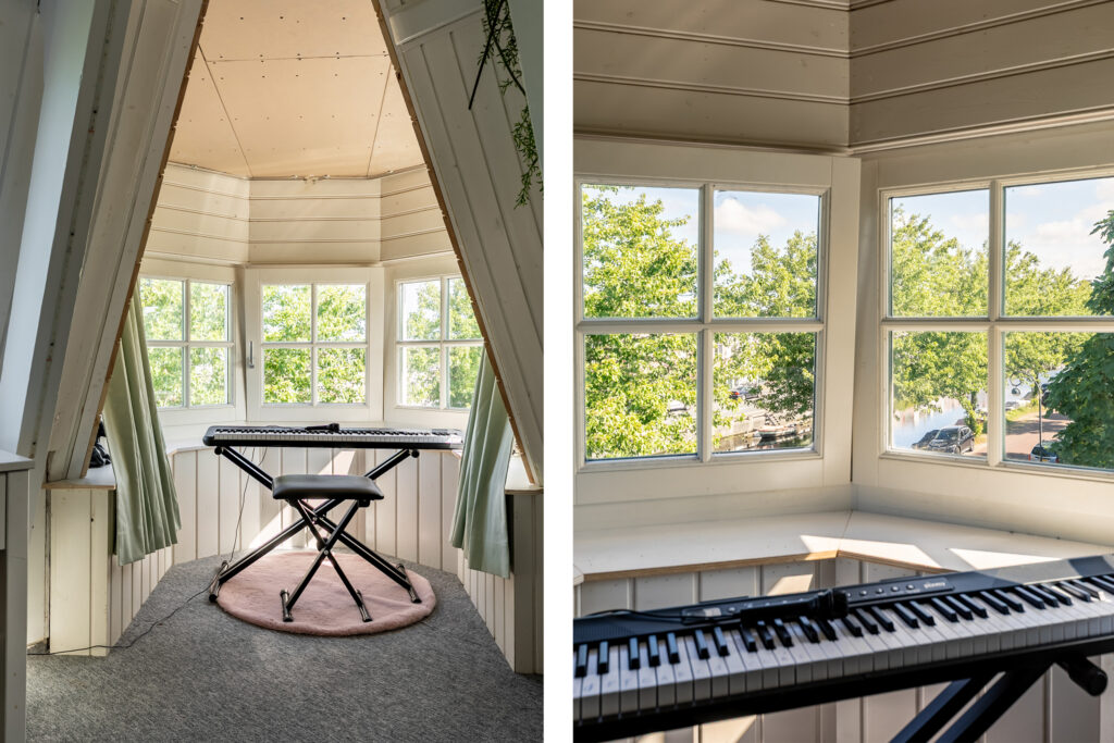 Cozy room with keyboard and sunny window view.
