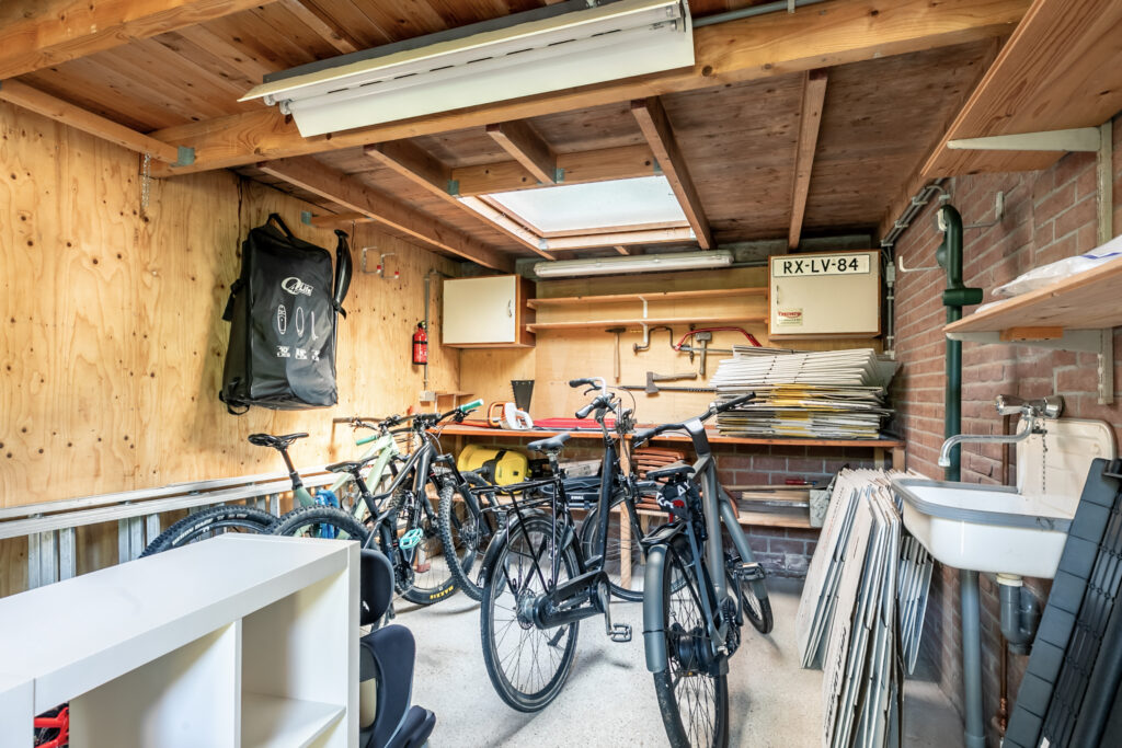 Organized garage with bicycles and tools