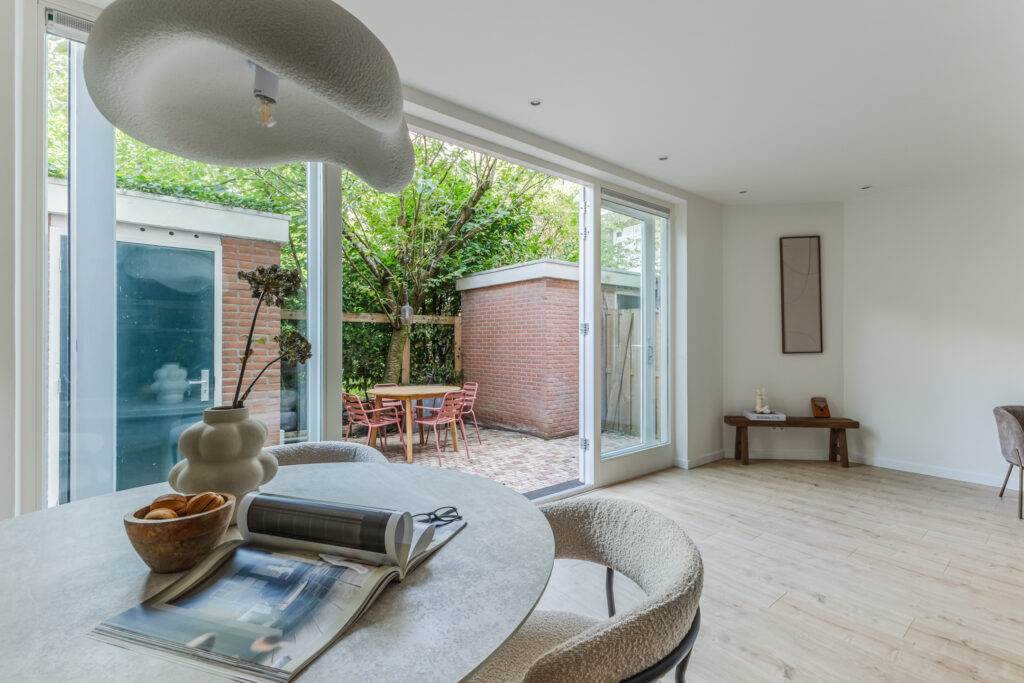 Modern dining area with garden access.