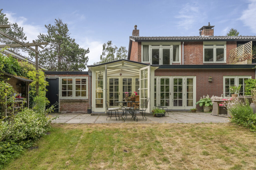 Brick house with garden and patio