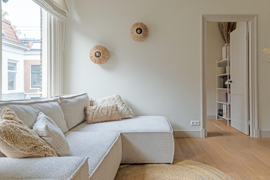 Cozy living room with beige sofa and decor