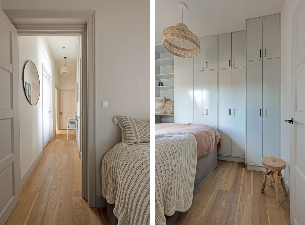 Spacious bedroom with wooden floors and wicker decor.