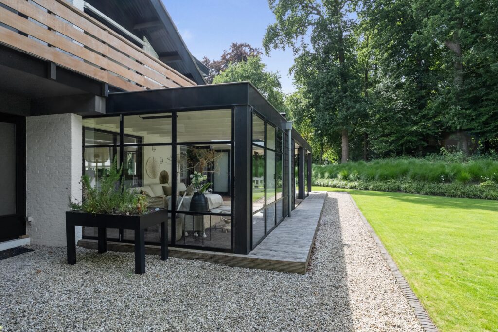 Modern glass extension with garden view