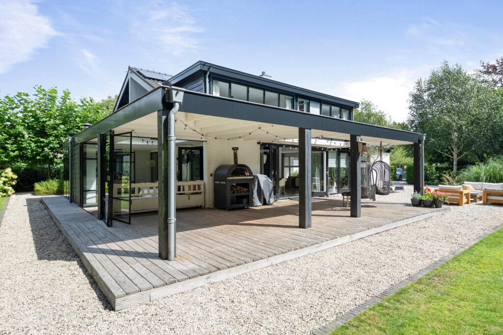 Modern patio with outdoor seating and greenery