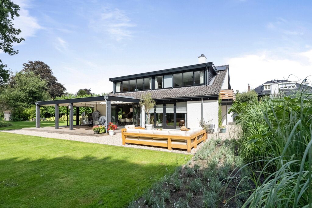 Modern house with garden and patio