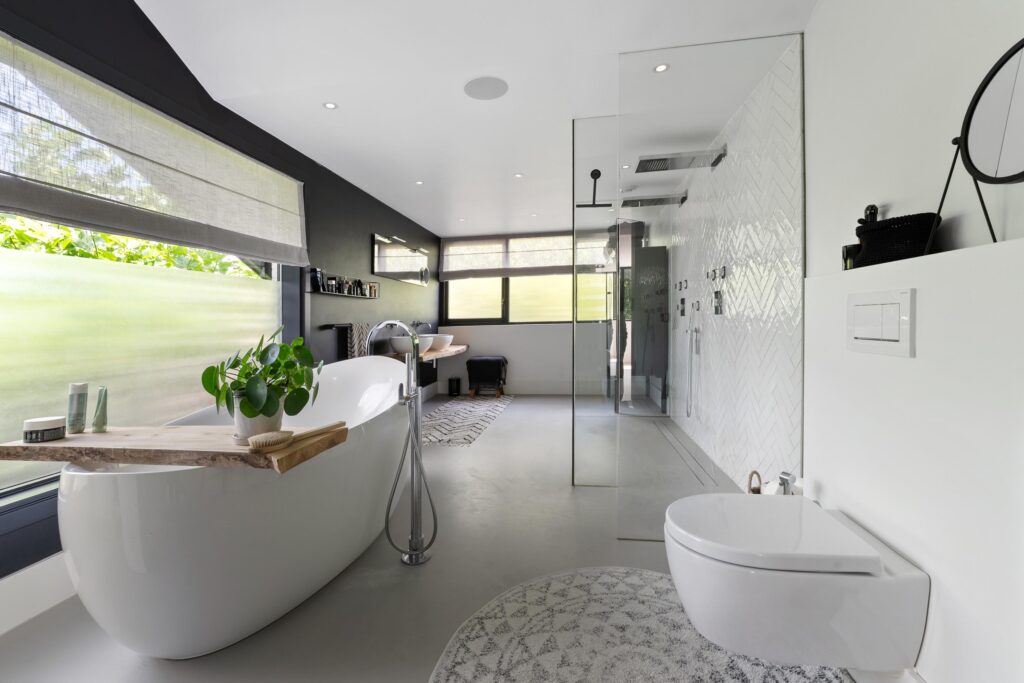 Modern bathroom with bathtub and shower