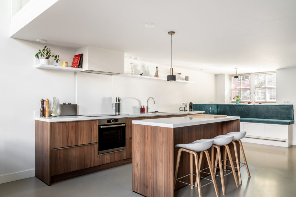 Modern kitchen with wooden cabinets and island.