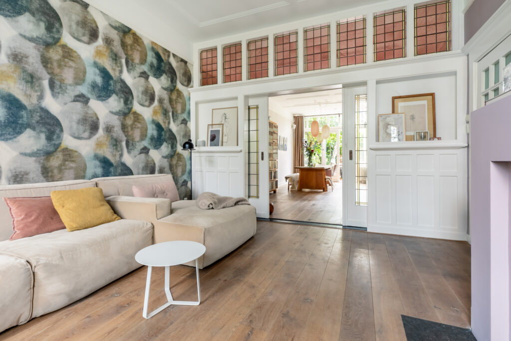 Cozy living room with modern decor and artwork.