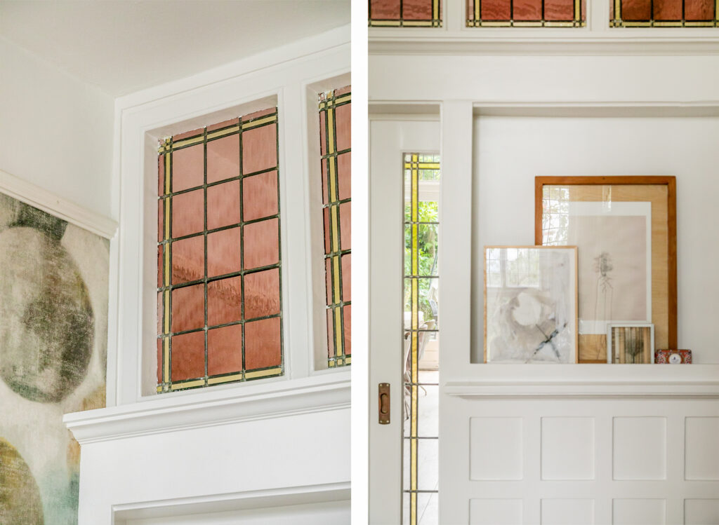 Interior with stained glass and framed artwork display.