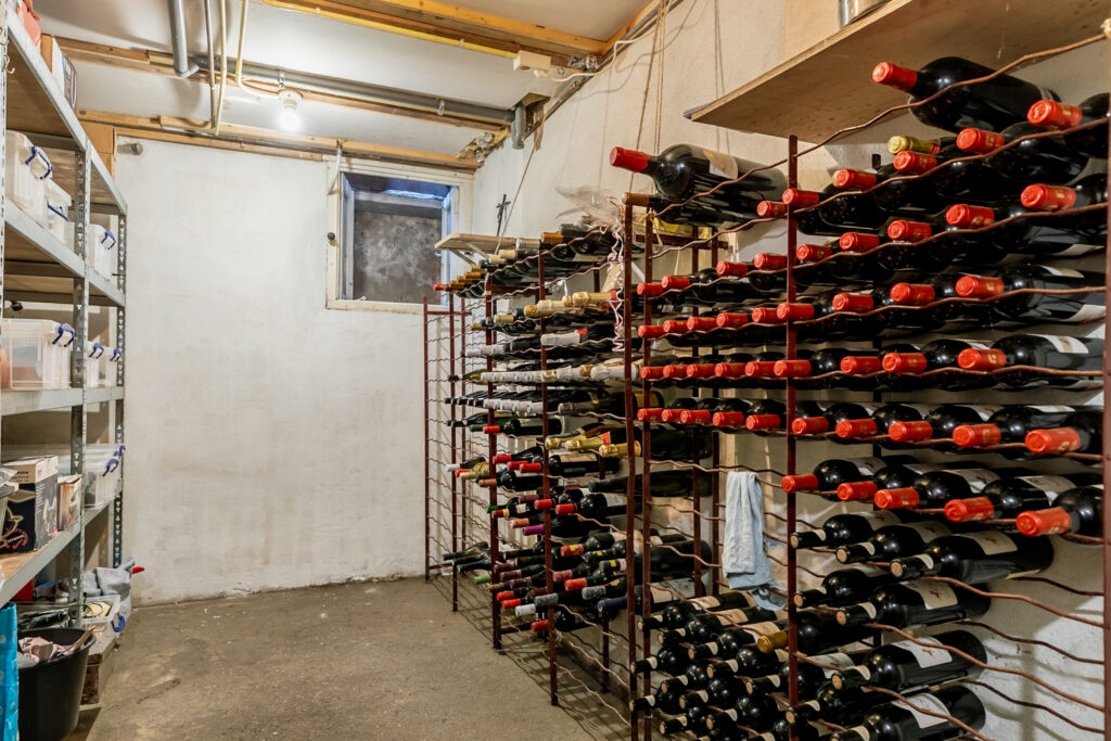 Wine cellar with bottles on racks