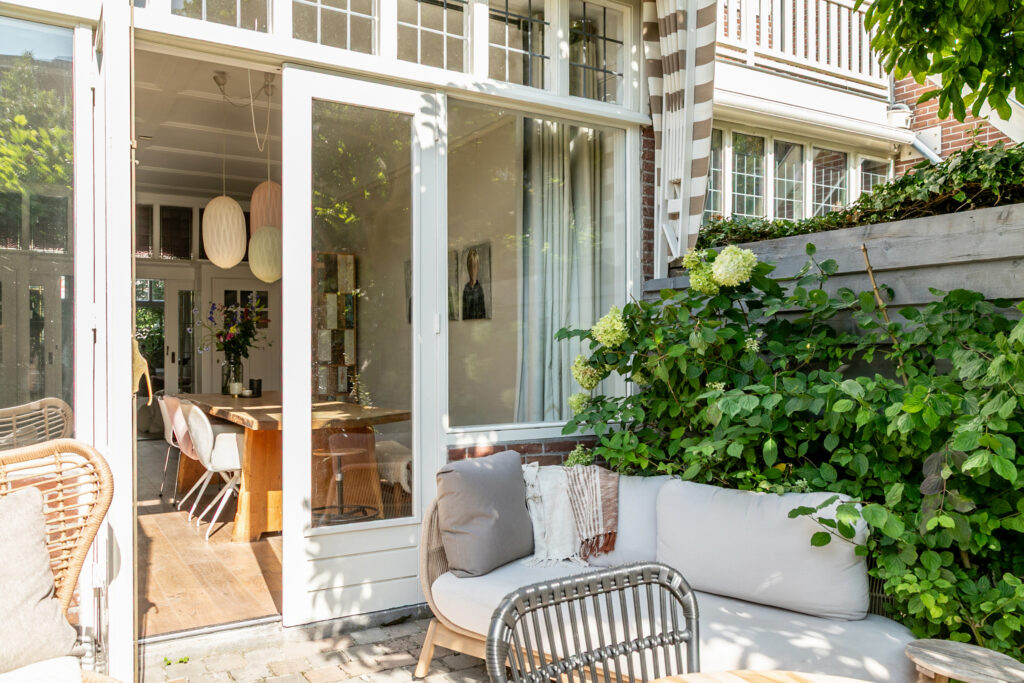 Cozy patio with outdoor seating and garden view