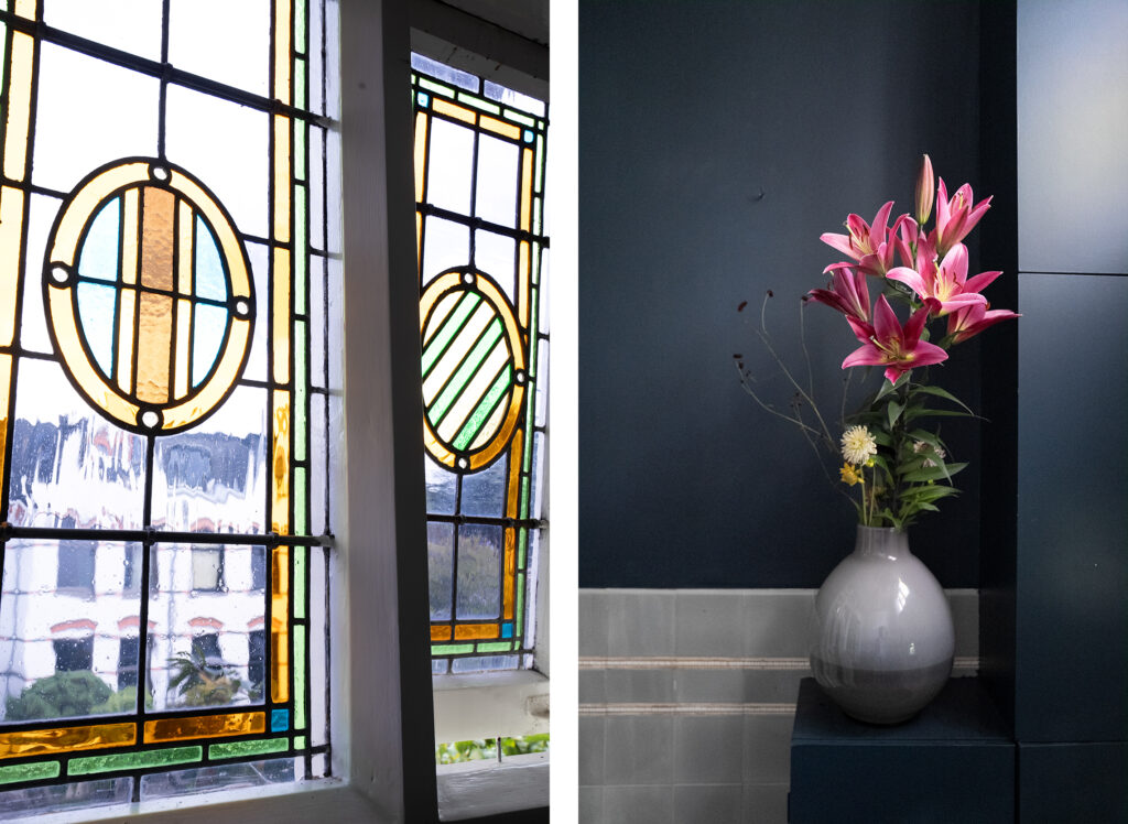 Stained glass window and vase with pink lilies
