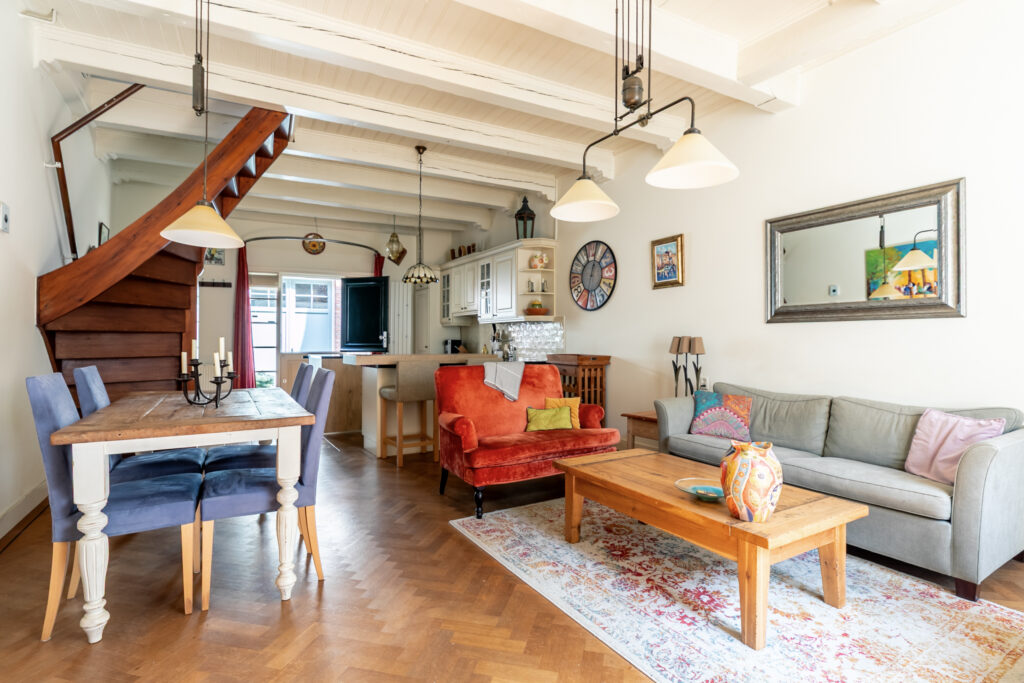 Cozy living room with vintage decor and furniture.