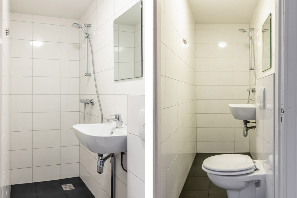 Modern tiled bathroom with shower and toilet.