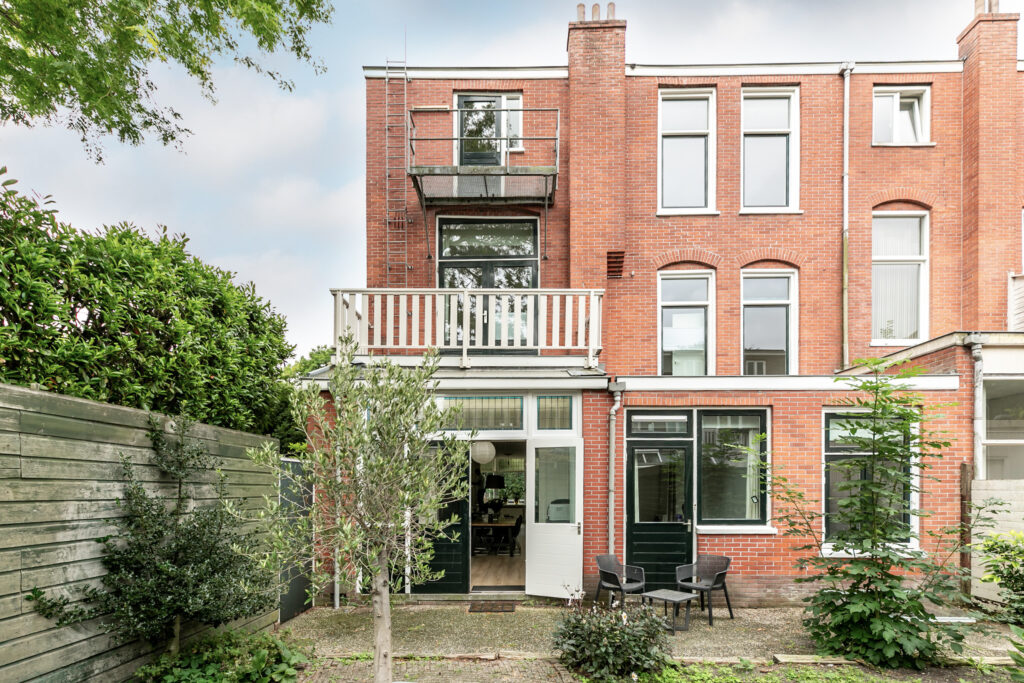 Red brick back of house with garden