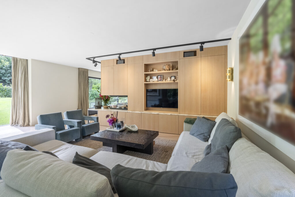 Modern living room with cozy furniture and decor.
