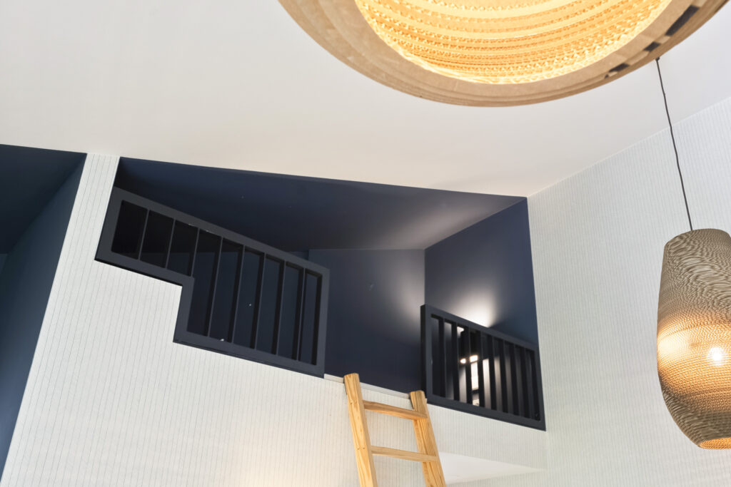 Modern loft ladder with hanging lights