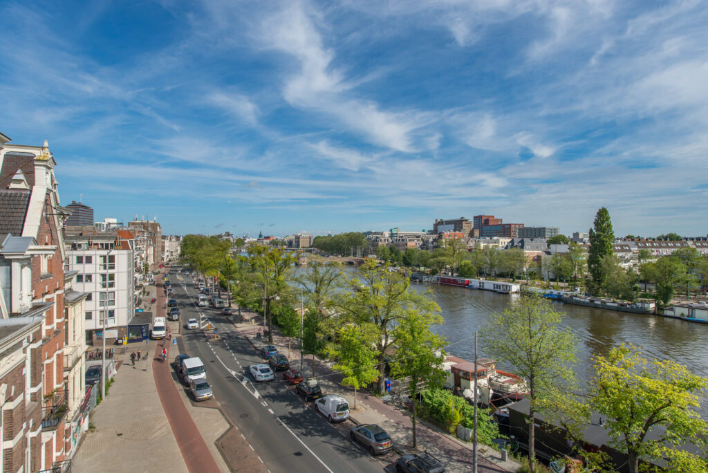 Scenic river view in a bustling cityscape.