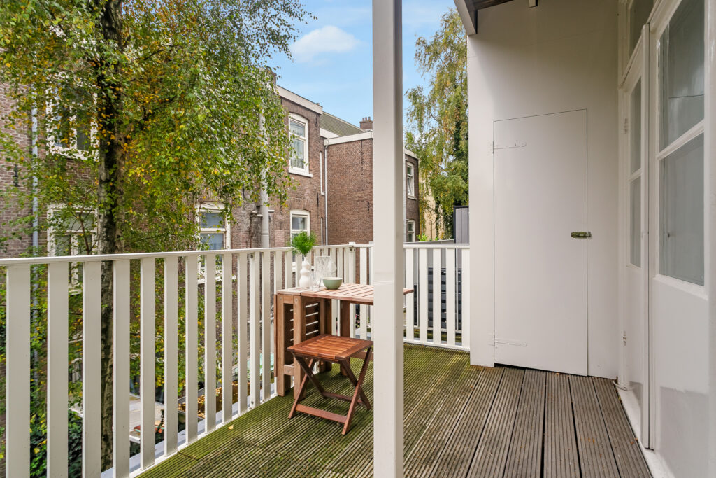 Cozy balcony with table and chairs
