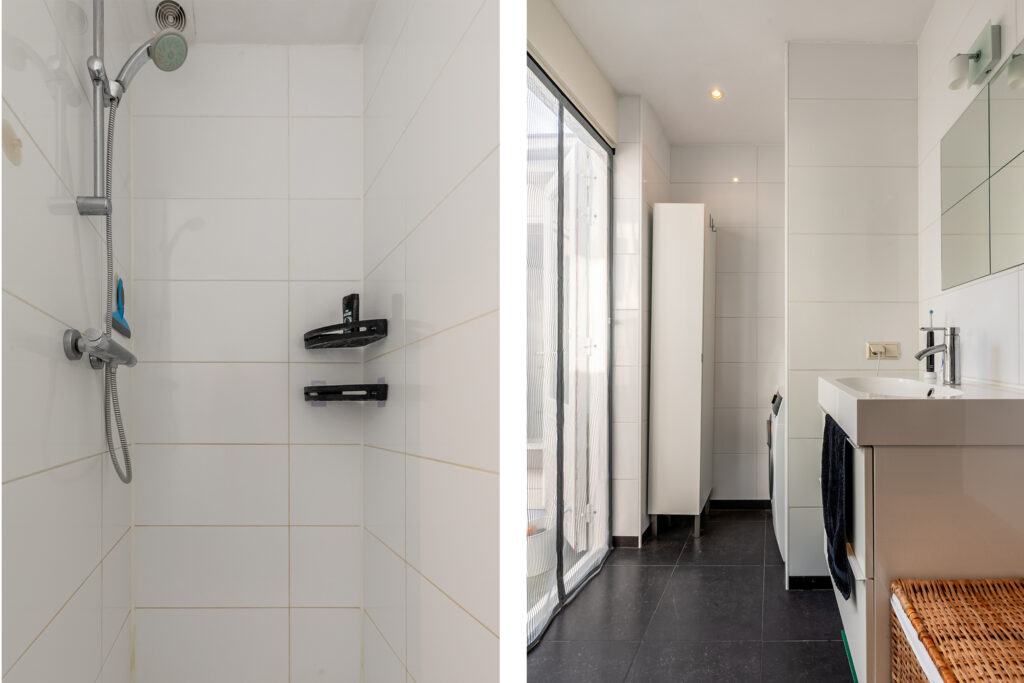 Modern bathroom with shower and vanity area.
