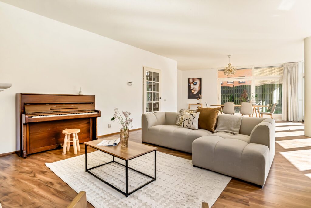 Modern living room with piano and sofa