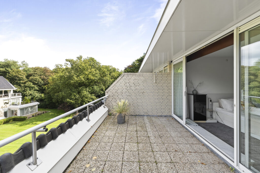 Spacious balcony with garden view