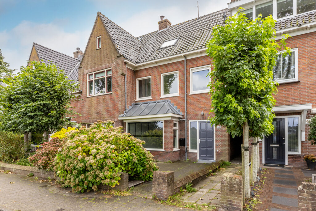 Charming brick townhouse with front garden.