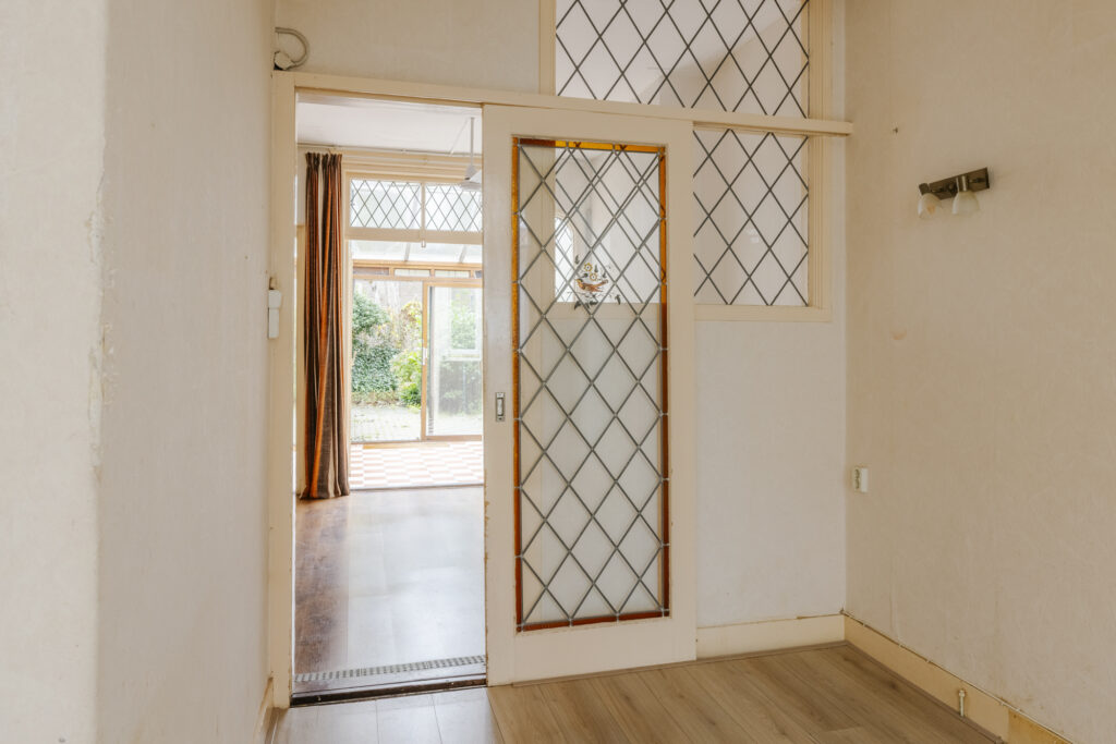 Interior with glass door and garden view