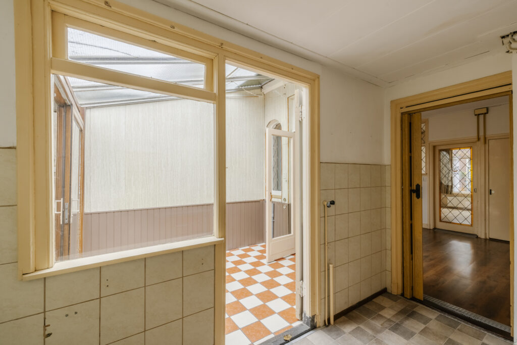 Interior with tiled floor and large windows