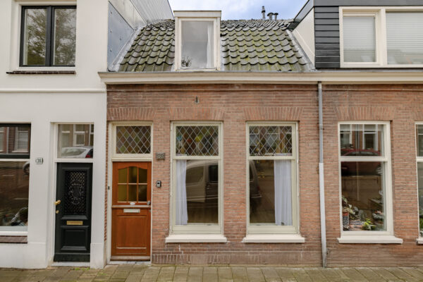 Charming Dutch brick house with a tiled roof.