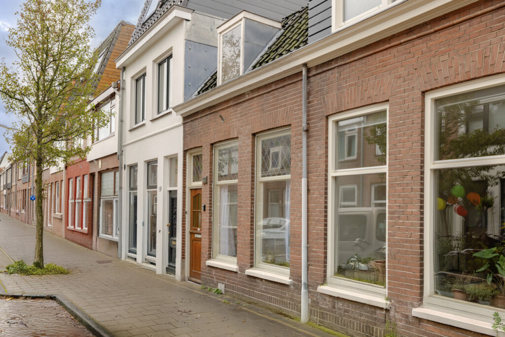 Brick houses on a quiet residential street.