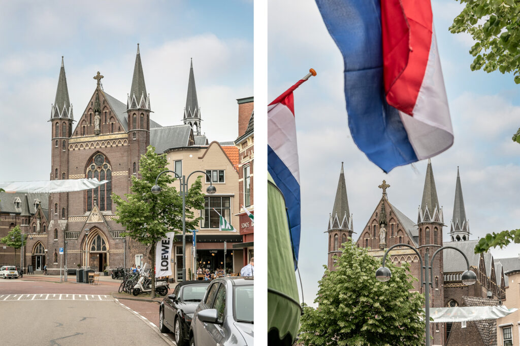 Gothic church with flags, street view.