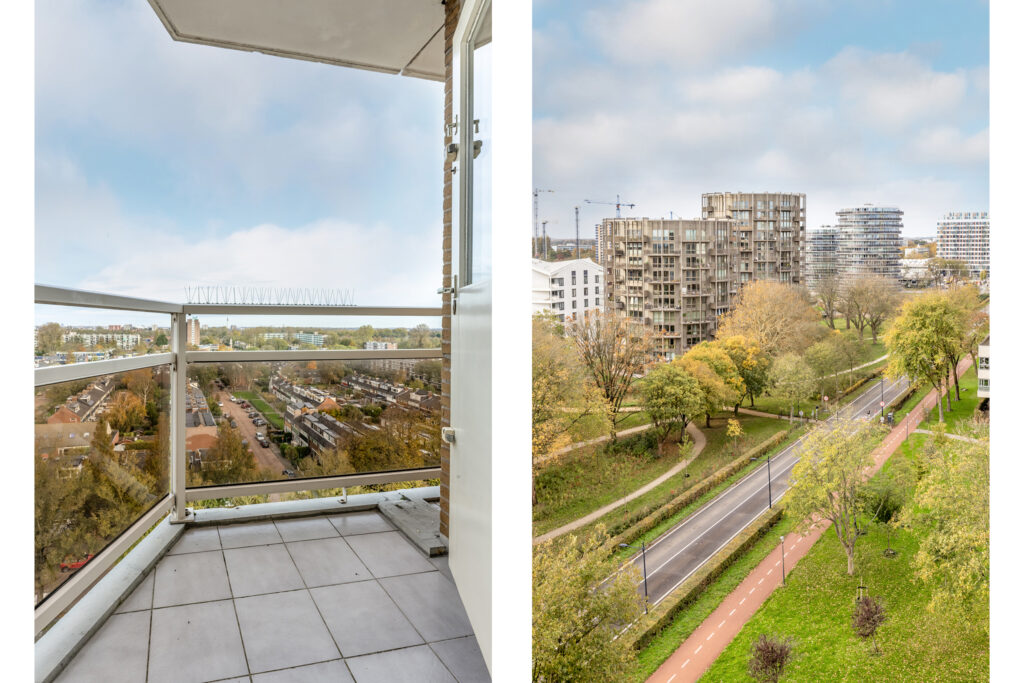 Balcony view of cityscape and green park.