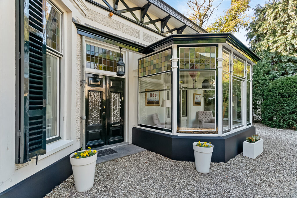 Elegant house entrance with stained glass windows