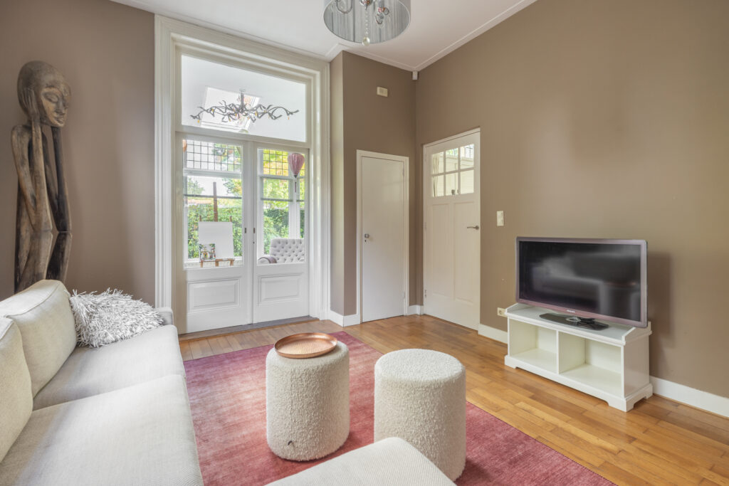 Cozy living room with modern furniture and decor.