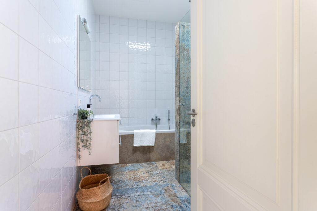 Modern bathroom with vanity and bathtub