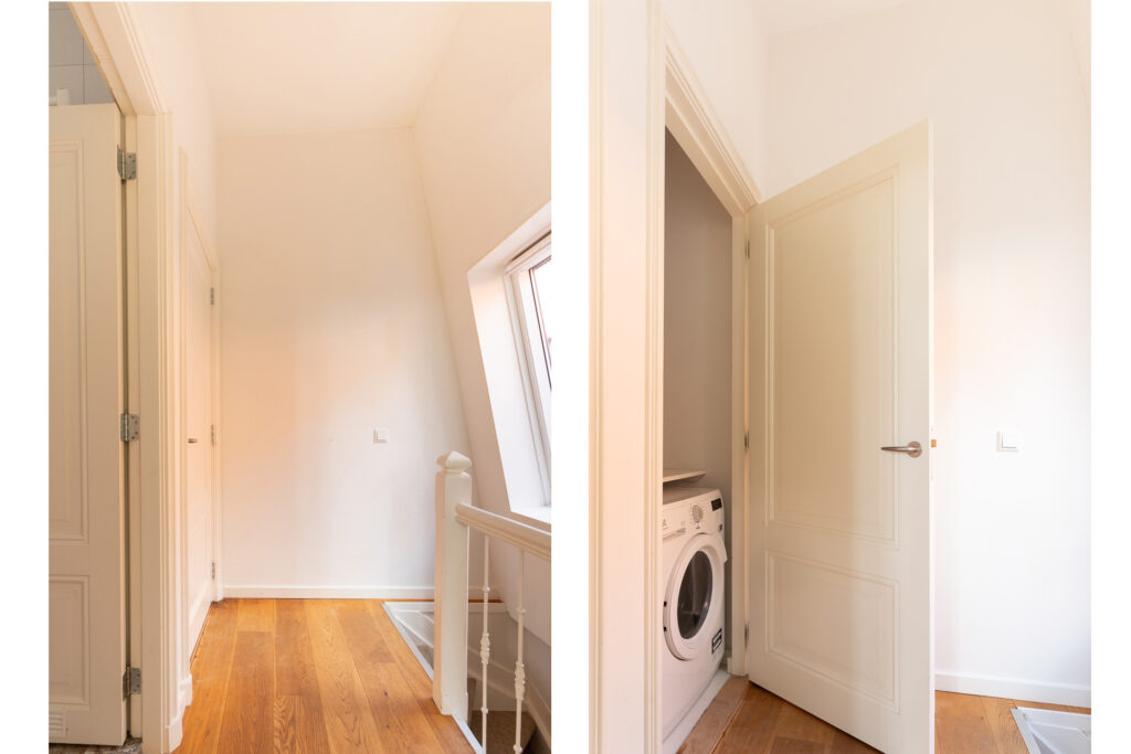 Hallway with washing machine and wooden floor.