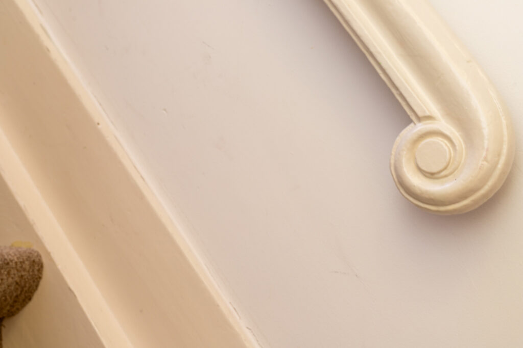 Close-up of a wooden handrail detail.